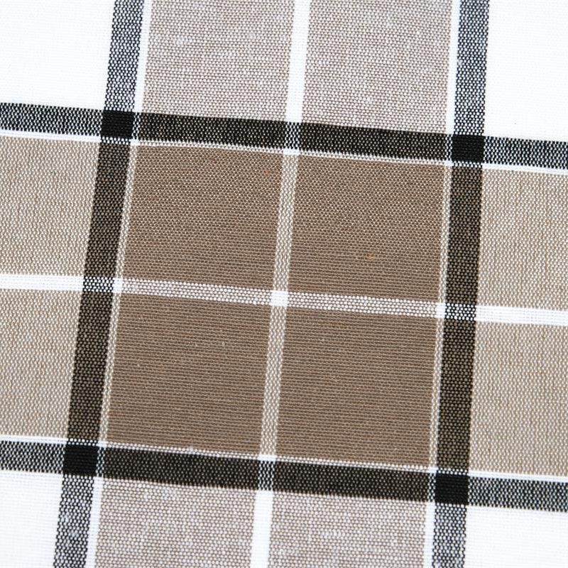 Klassiskt rutigt mönster i neutralt beige, brunt och svart på tyg, mångsidigt för hemtextil.