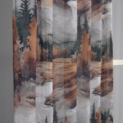 Detaljbild av landskapstryck med skog, vatten och fjäll i varma, dovt tonade färger.