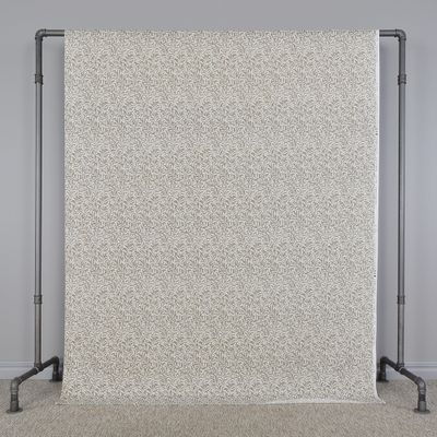 Ramas beige tyg med kvistar och blad
