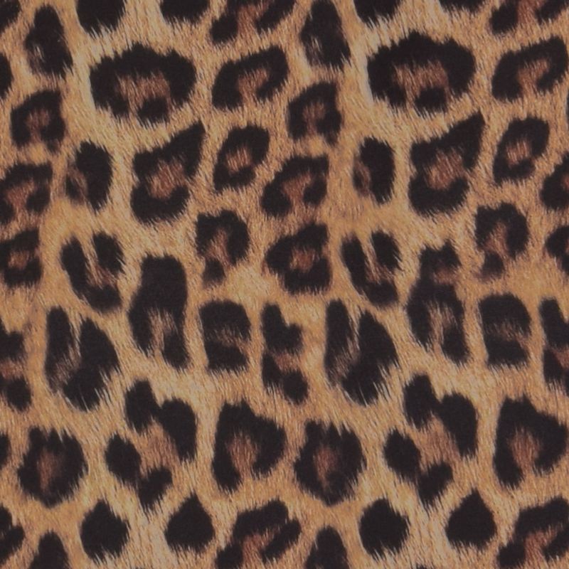 Leopard mönstrat softshell tyg med svart microfleece.