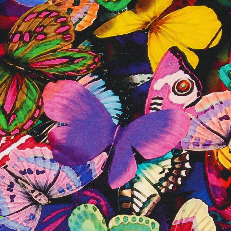 Digitaltryckt joggingtyg med motiv av fjärilar i massor av färger på metervara