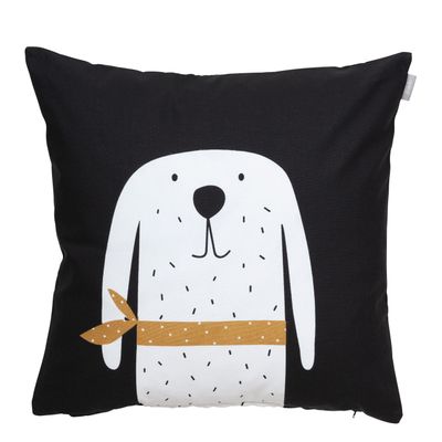 Svart kuddfodral med vit hund som bär en gul bandana