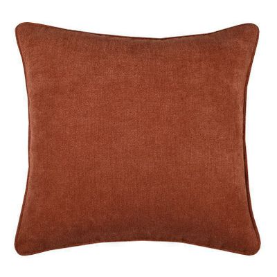 Läcker rost- röd prydnadskudde fylld, fodral med blixtlås nedtill för snabbt underhåll, idealisk för en modern soffa eller fåtölj