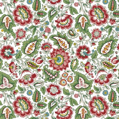 Mönstrat tyg i metervara – Blombacka med folkloristiska blommor i röda, gröna och blå toner på ljus botten.