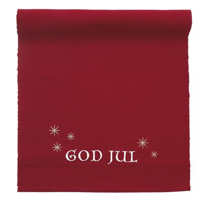 Röd löpare i bomull med broderad text “God Jul” och stjärnor, perfekt för juldukning.