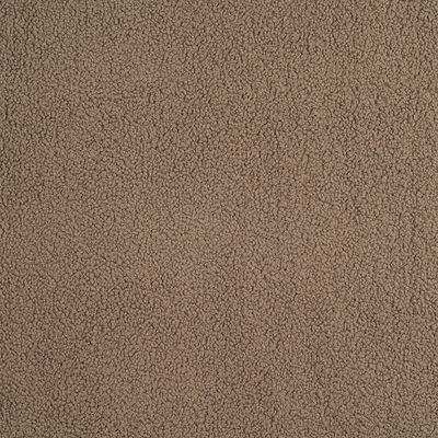 Närbild av Sheep toffee möbeltyg med mjuk och tät fuskfårpälsstruktur i varm beigebrun ton