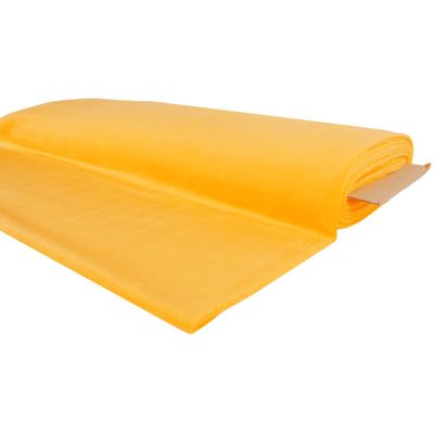Gult velour tyg med mjuk yta för sömnad av kläder och gosse djur.
