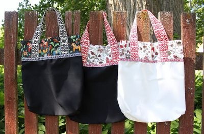 Leksand Mini Svart Tyg med Traditionellt Dalahästtryck