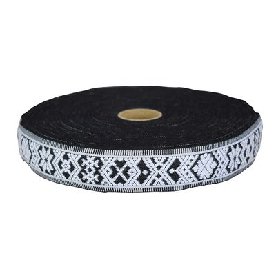 Hemslöjdsband Allmoge svart bomullsband för dekoration i hemslöjds stil i svart och vitt, tillverkade i Sverige.
