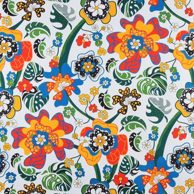 Tyg med stormönstrat, blommigt, snirkligt mönster i härliga färger. Design av Sari Ahokainen, Finlands svar på Josef Frank