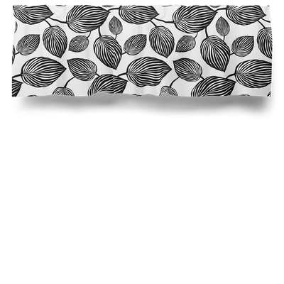 Gardinkappa på metervara Lyckans blad med vit botten och svarta blad från Arvidssons Textil.