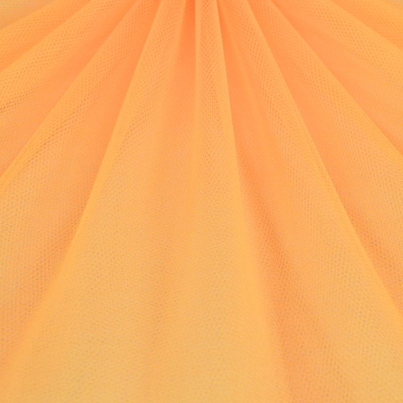 Tyll tyg på metervara i neon orange för sömnad av kläder, hobby, maskerad, diy, pom pom och danskläder.