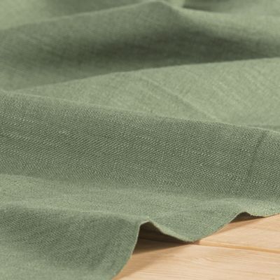 Washed linne allmogegrön tyg