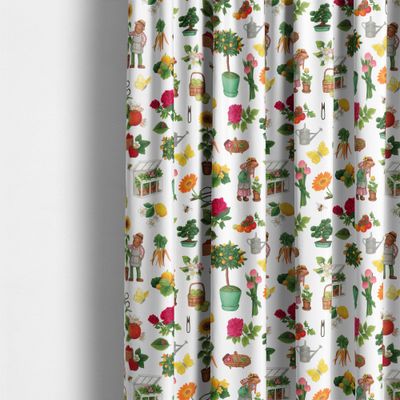 Gardin sydd i Gräv & Gro multi tyg med mönster av odlare, växter och blommor