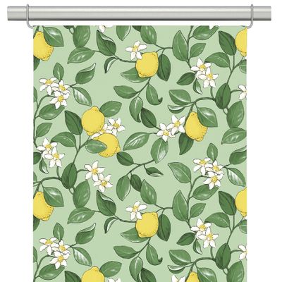 Grön panelgardin med mönster av gula citroner, gröna blad och vita blommor