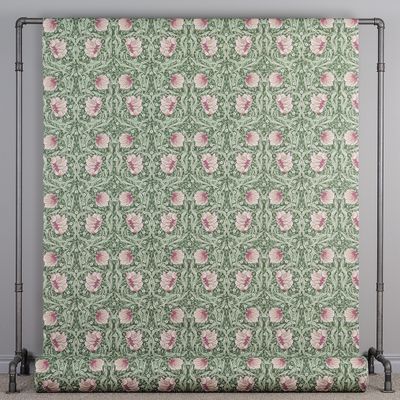 Tyg på rulle med blommönster i rosa och ljusgröna toner