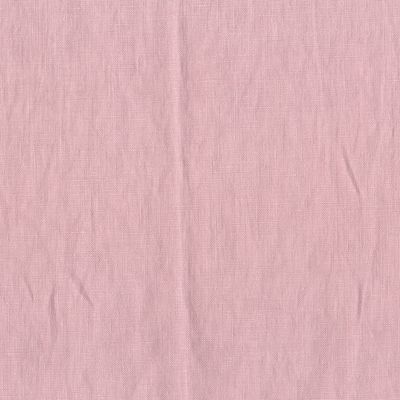 Stentvättat linne i rosa, tyget har en mjuk och tunn känsla och är rosa.