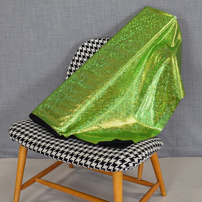 Green shiny metallic foil spandex, fabrics are stretchy, fits nicely for decoration, dancing clothes and disco clothes.