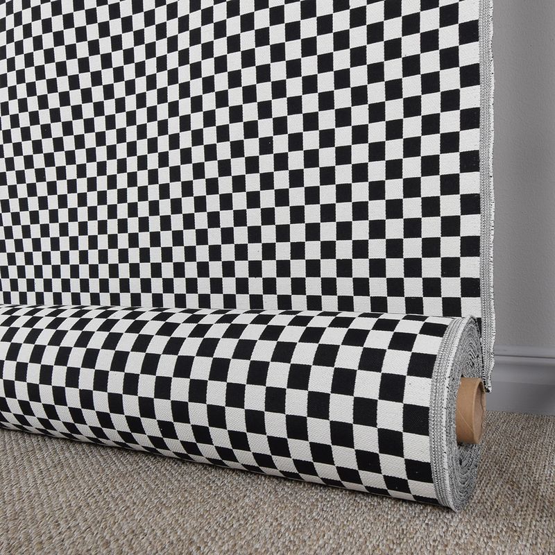 acquardtyg med schackrutigt mönster i svart och vitt. Certifierat enligt OEKO-TEX och varje ruta i mönstret är 2x2 cm. Idealiskt som möbel- eller gobelängtyg