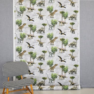 Velociraptor curtains and decorative fabrics with motifs of dinosaurs sold by the meter online at nordictextiles.com.