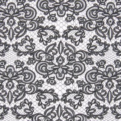 Ekologiskt trikåtyg med motiv av svart spets med vit botten från by Ernst textil