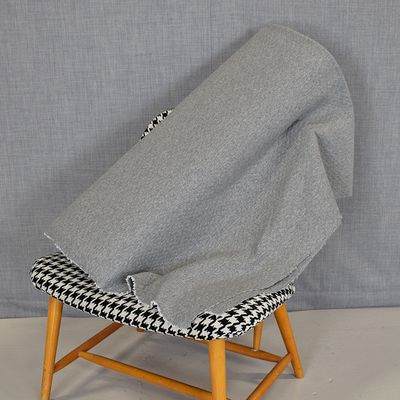 Quilted knitwear grey melange fabric