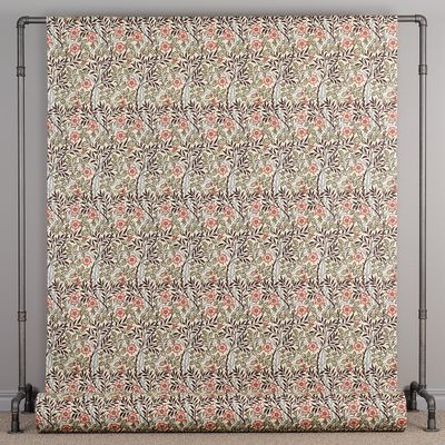 Helbild av Sweet Flower tyg med upprepat blommönster i jordnära färger