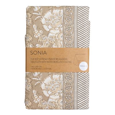 Sonia beige akrylatduk i bomull med dekorativt mönster, 140x250 cm